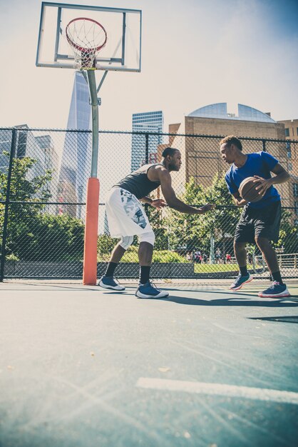 Basketball player playing outdoors