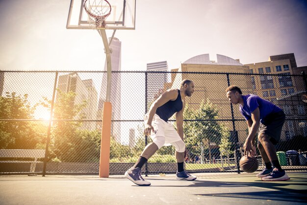 Basketball player playing outdoors