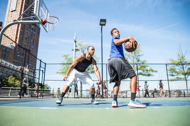 Basketball player playing outdoors