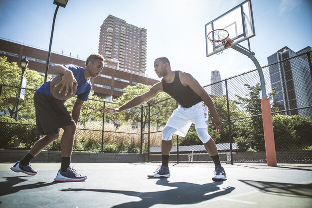 Basketball player playing outdoors