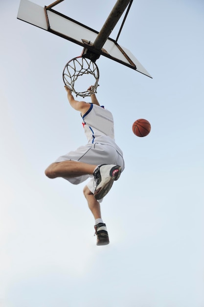 basketball player practicing and posing for basketball and sports athlete concept