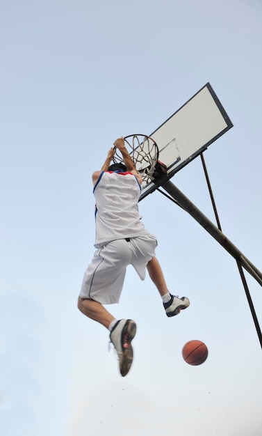 basketball player practicing and posing for basketball and sports athlete concept