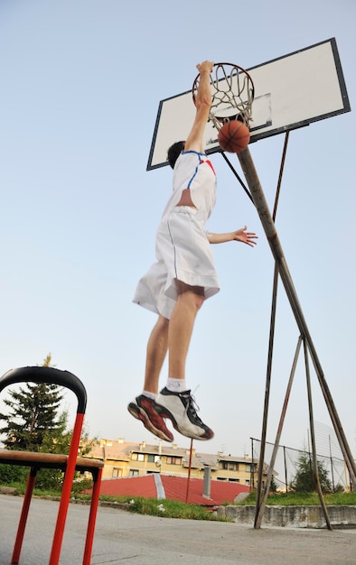 basketball player practicing and posing for basketball and sports athlete concept