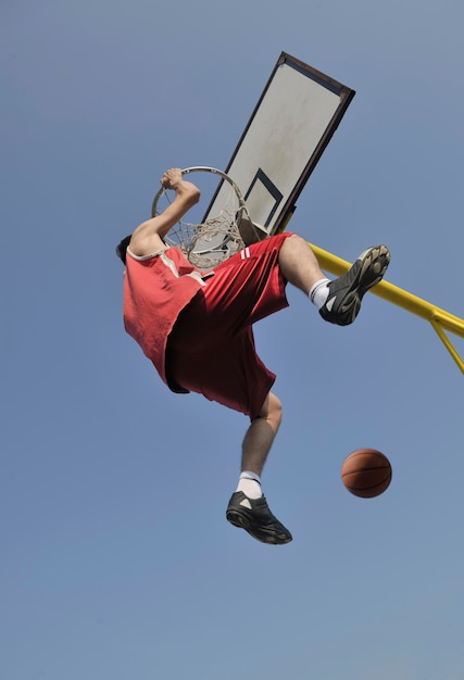 basketball player practicing and posing for basketball and sports athlete concept