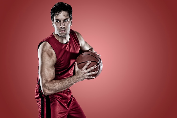 Photo basketball player on a  red uniform