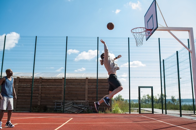 Basketball Player Shooting Slam Dunk