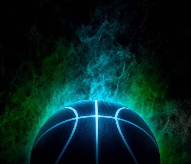 फोटो basketball with bright blue glowing neon lines on the color smoke background