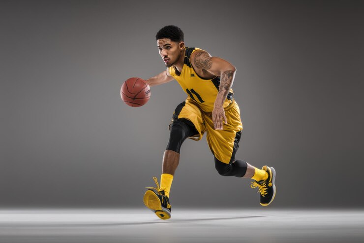 basketbalspelers in actie donkere concept