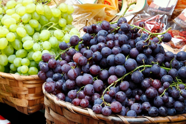 Baskets of grapes in a market