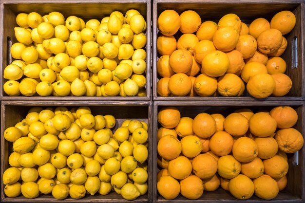 Baskets with oranges and lemons in the mall