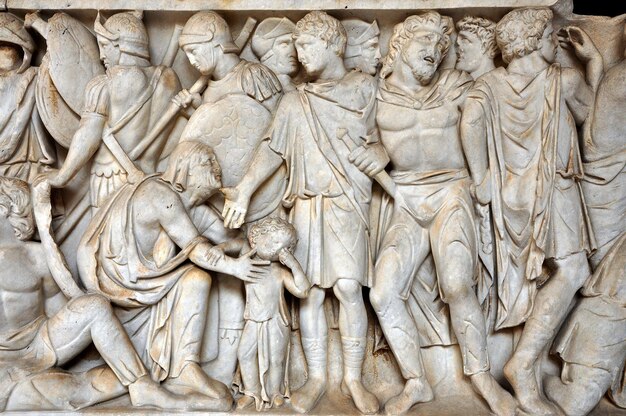 Basrelief and sculpture details in stone of Roman Gods and Emperors