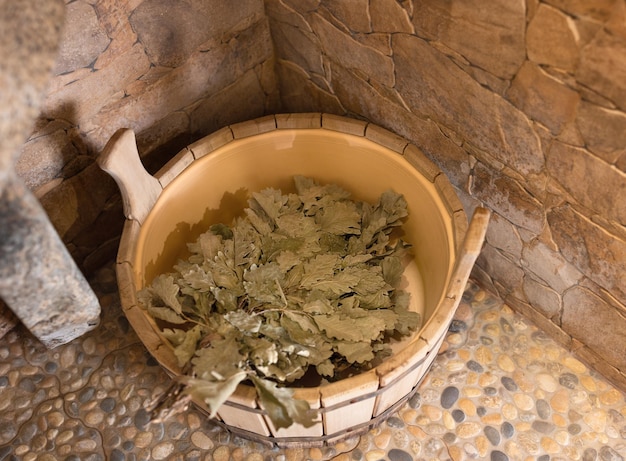 Bath accessories basin broom in a Russian bath