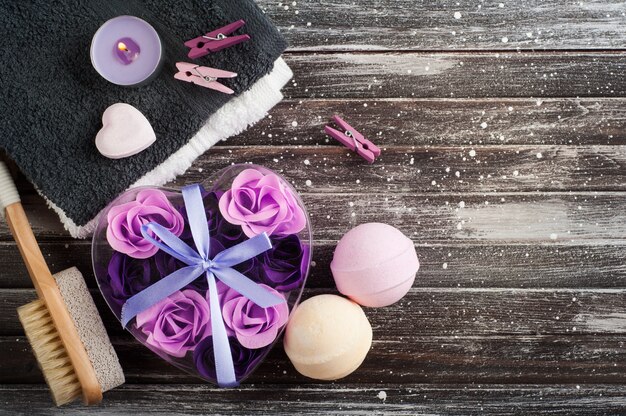 Bath accessories on rustic wooden table