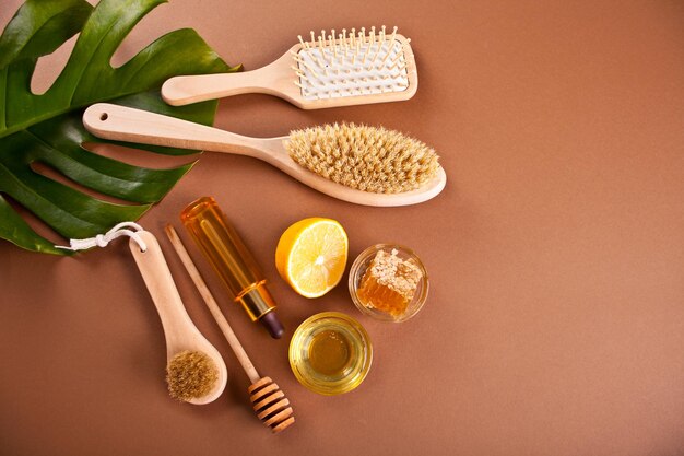 Bath and beauty spa personal hugiene accessories on the brown background