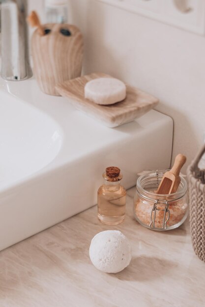 The bath bomb and other spa products in the bathroom