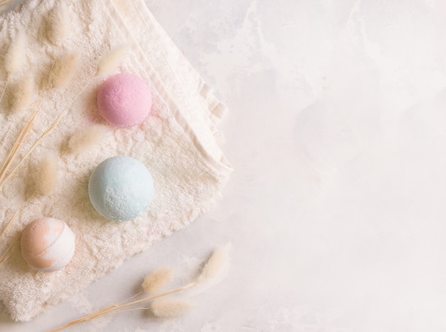 Bath bombs on a towel. View from above. Copy space