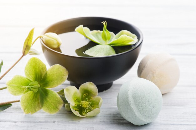 Bath bombs on white wooden 