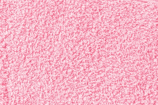 Bath sheet or towel twxture in color of the year 2023 Viva Magenta Closeup of texture copy space