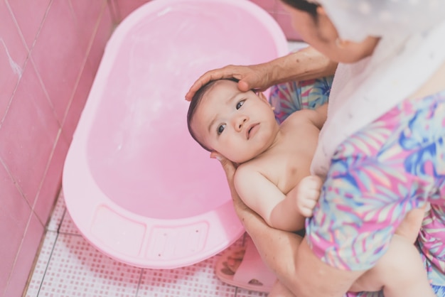 Photo bath time for a cute little baby