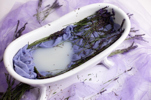 bath with lavender flowers. photo zone for a photo shoot with lavender