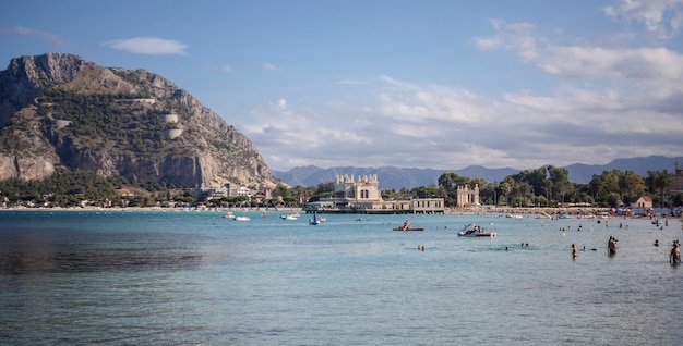 Bathers in Mondello during a hot summer afternoon