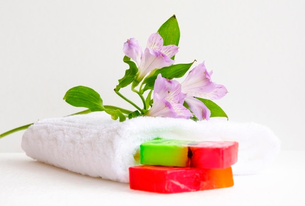 Bathroom accessories luff alstroemeria flower handmade soap and white towel