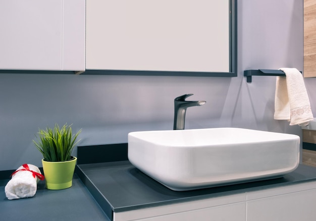 Bathroom interior with sink and faucet