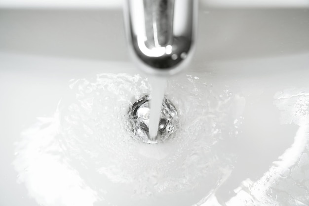 Bathroom sink or hand basin with running water