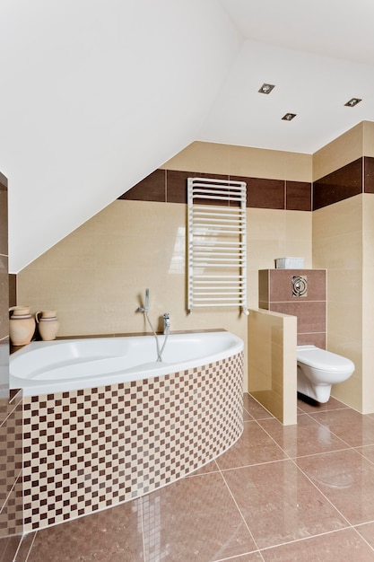 Bathroom with beige tiles