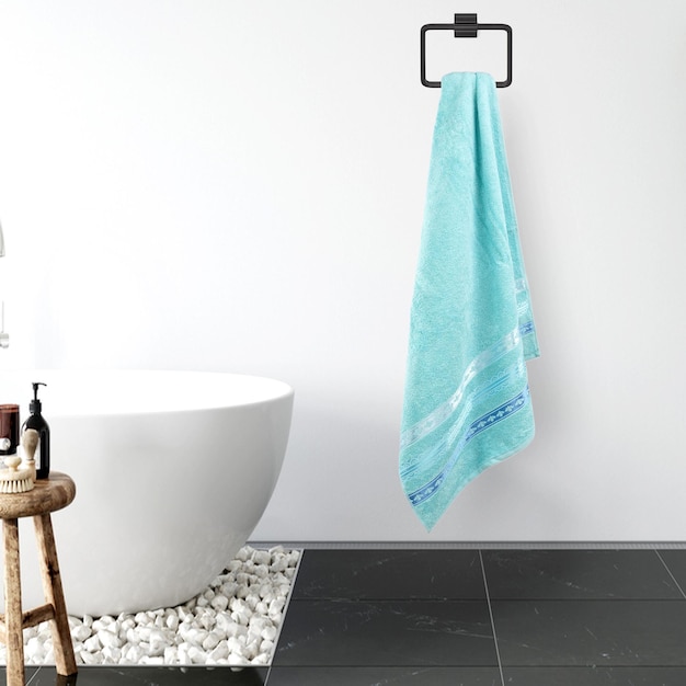 A bathroom with a blue towel hanging from a rack