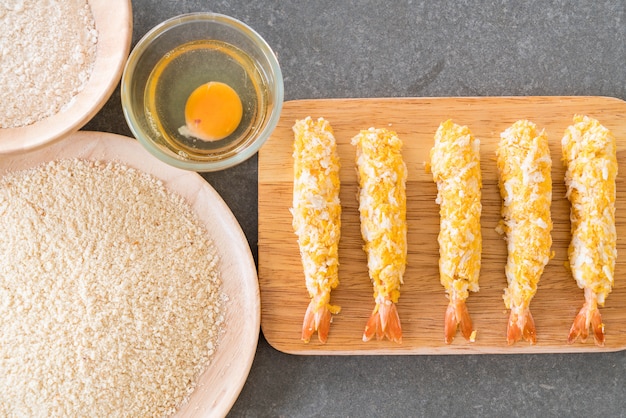 batter-fried prawns on wood board