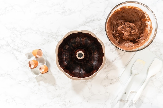 Batter to pan chocolate bundt cake preparation