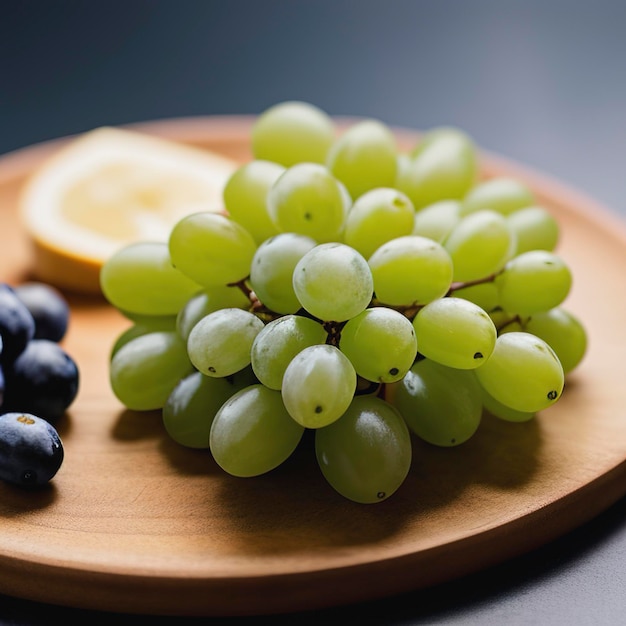 Bavaria blue cheese with grapes on board close up