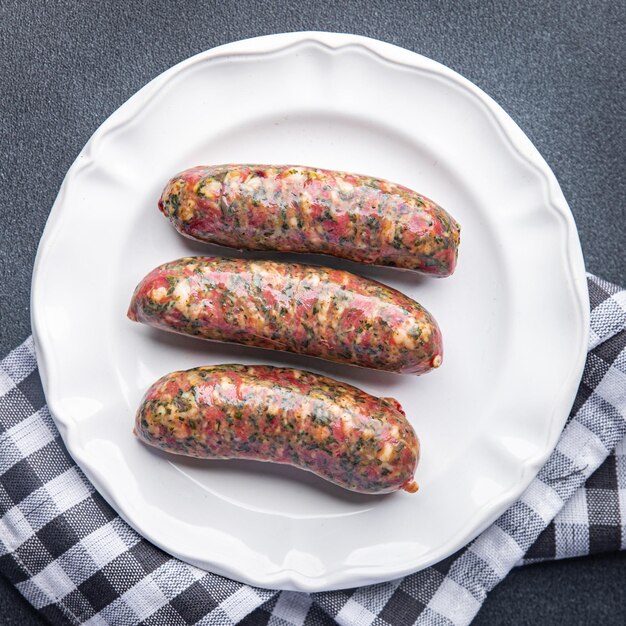 Bavarian sausage meat fresh ground pork, beef meal food snack on the table copy space food