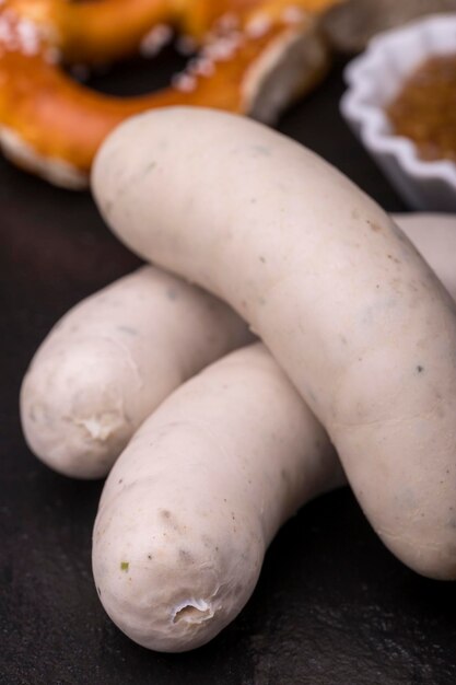 Bavarian white sausages on black slate