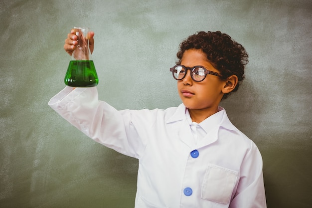 Bboy holding conical flask in classroom