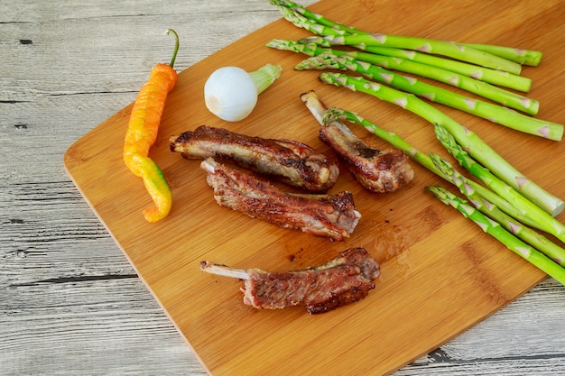 BBQ grilled ribs with vegetables