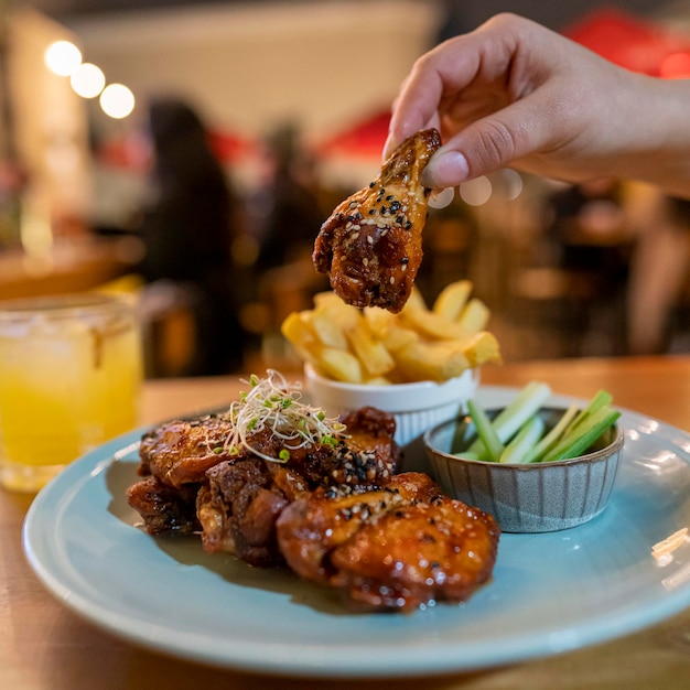 bbq wings, with french fries and salad