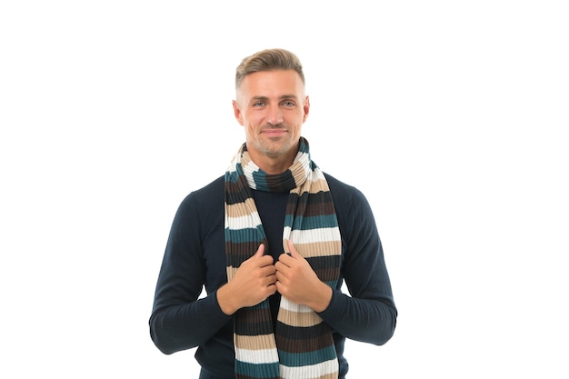 Be in trend. male fashion for cold season. say no to flu. man in warm knitting isolated on white. happy unshaven man in winter scarf. feel cozy and comfortable. handsome smiling mature guy.