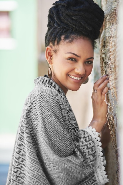 Be your fabulous self Portrait of a fashionable young woman posing against a wall