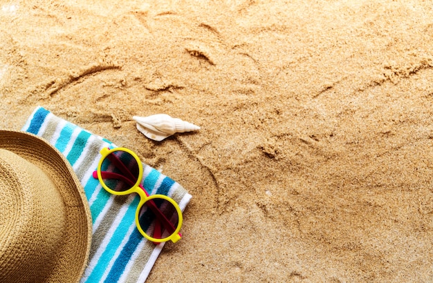 Beach Accessories On Table On Beach - Summer Holidays