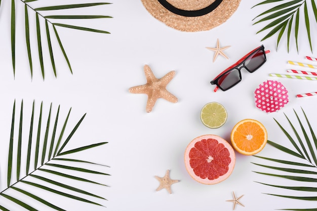 Beach accessories on a white background. Summer background