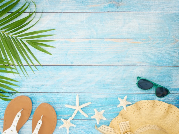 Beach accessories with palm leaves.