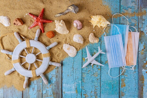 Beach accessories with sand and a protective mask