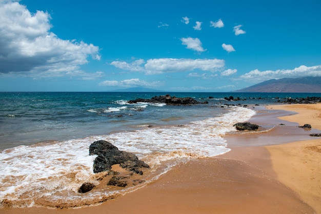 Beach background calm beautiful ocean wave on sandy beach sea view from tropical sea beach