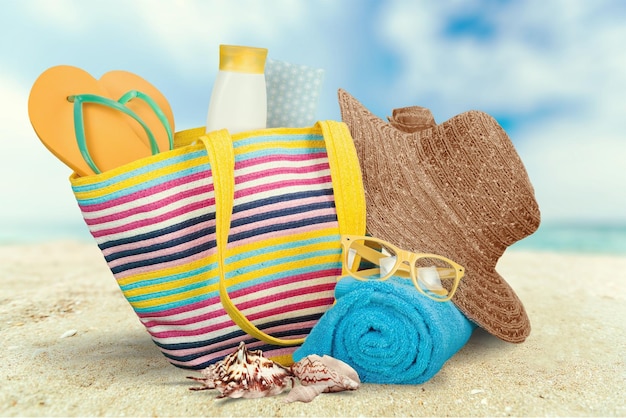 Beach bag on beach background