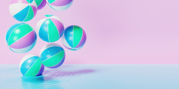 Beach balls falling on blue liquid with pink retro pastel background