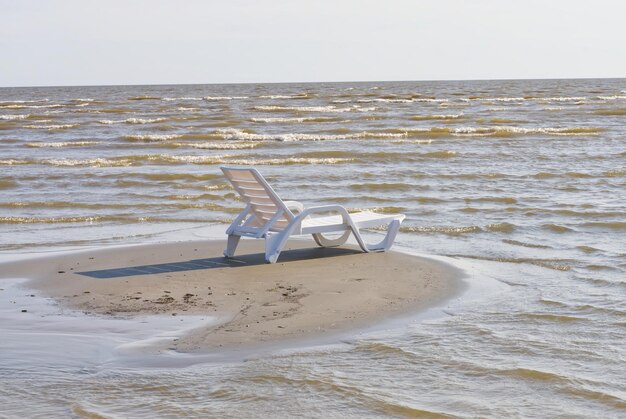 Beach chair in the midle of the sea