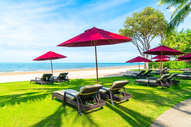 beach chair and umbrella with ocean sea beach