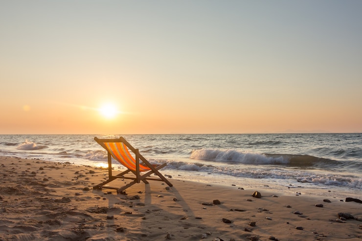 Photo beach chair with sunset